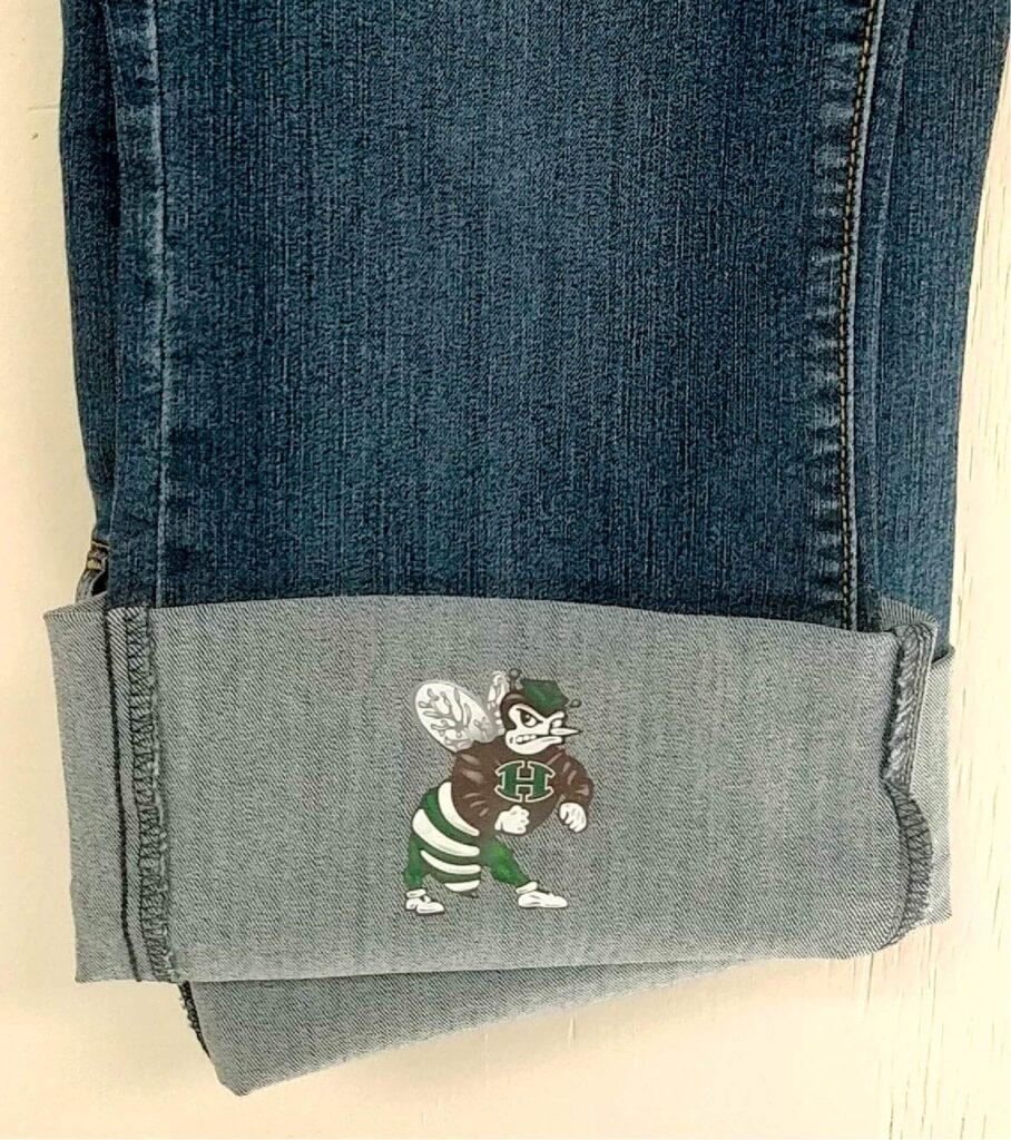 embroidered mascot on jeans